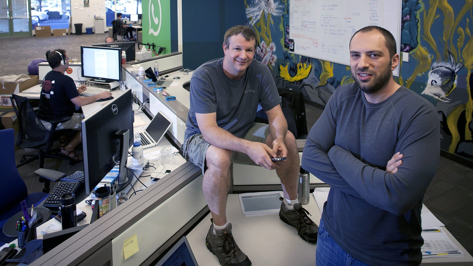Brian Acton (left) and Jan Koum (right), founders of WhatsApp, at the company's headquarters in California.