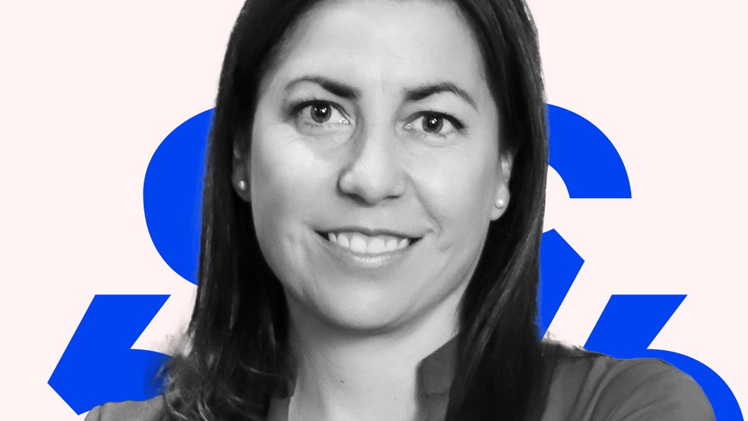 A headshot of Gabriela Estrada placed over blue diacritics and a light pink background.