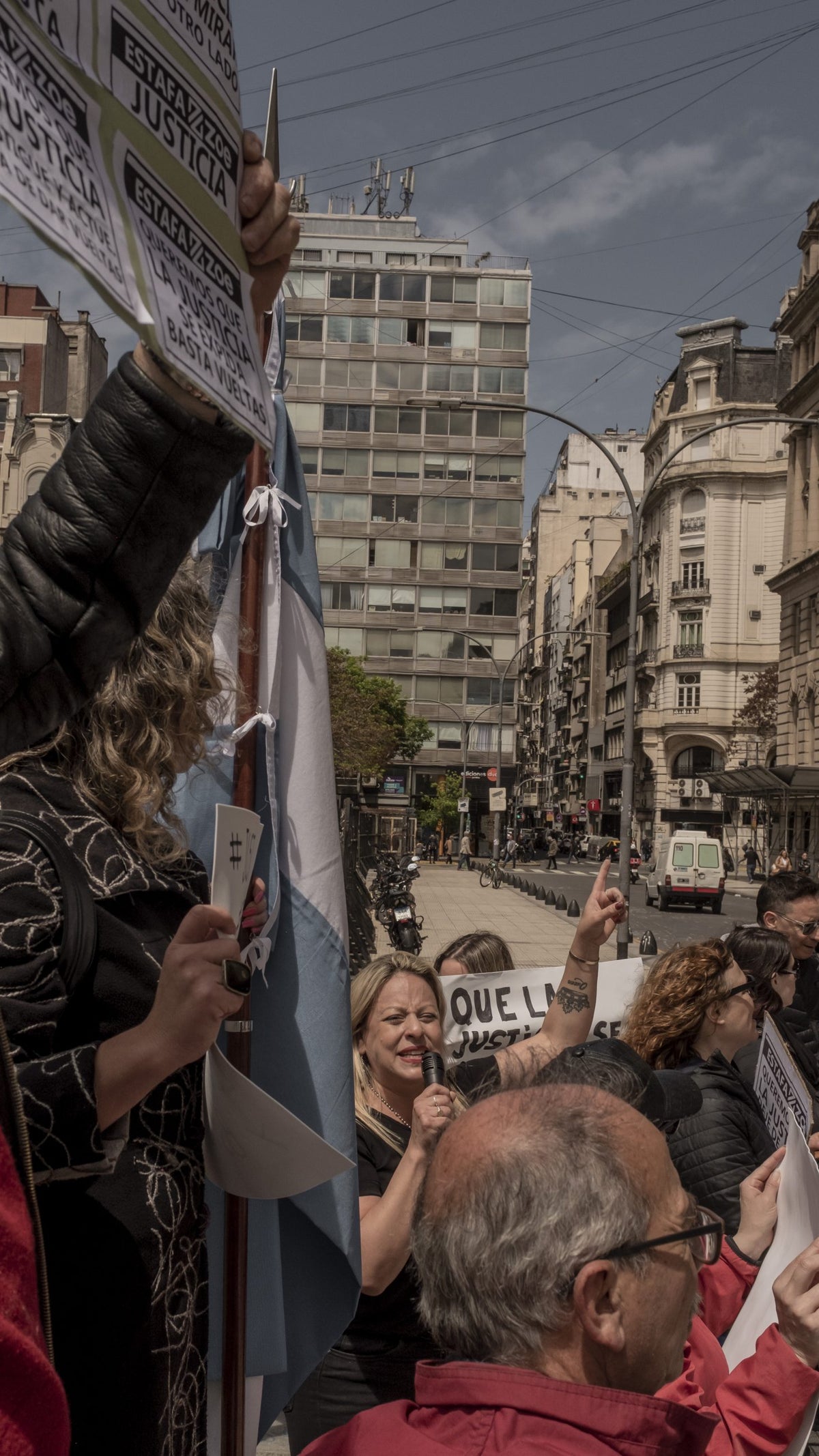 A photo of people protesting against Generation Zoe on a city street in Argentina.