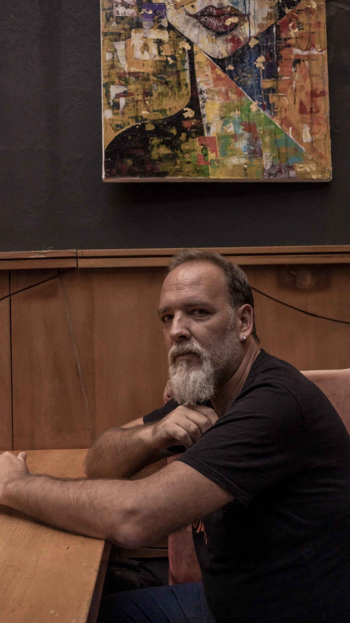 A photo of computer programmer Javier Smaldone seated at a table in Argentina.