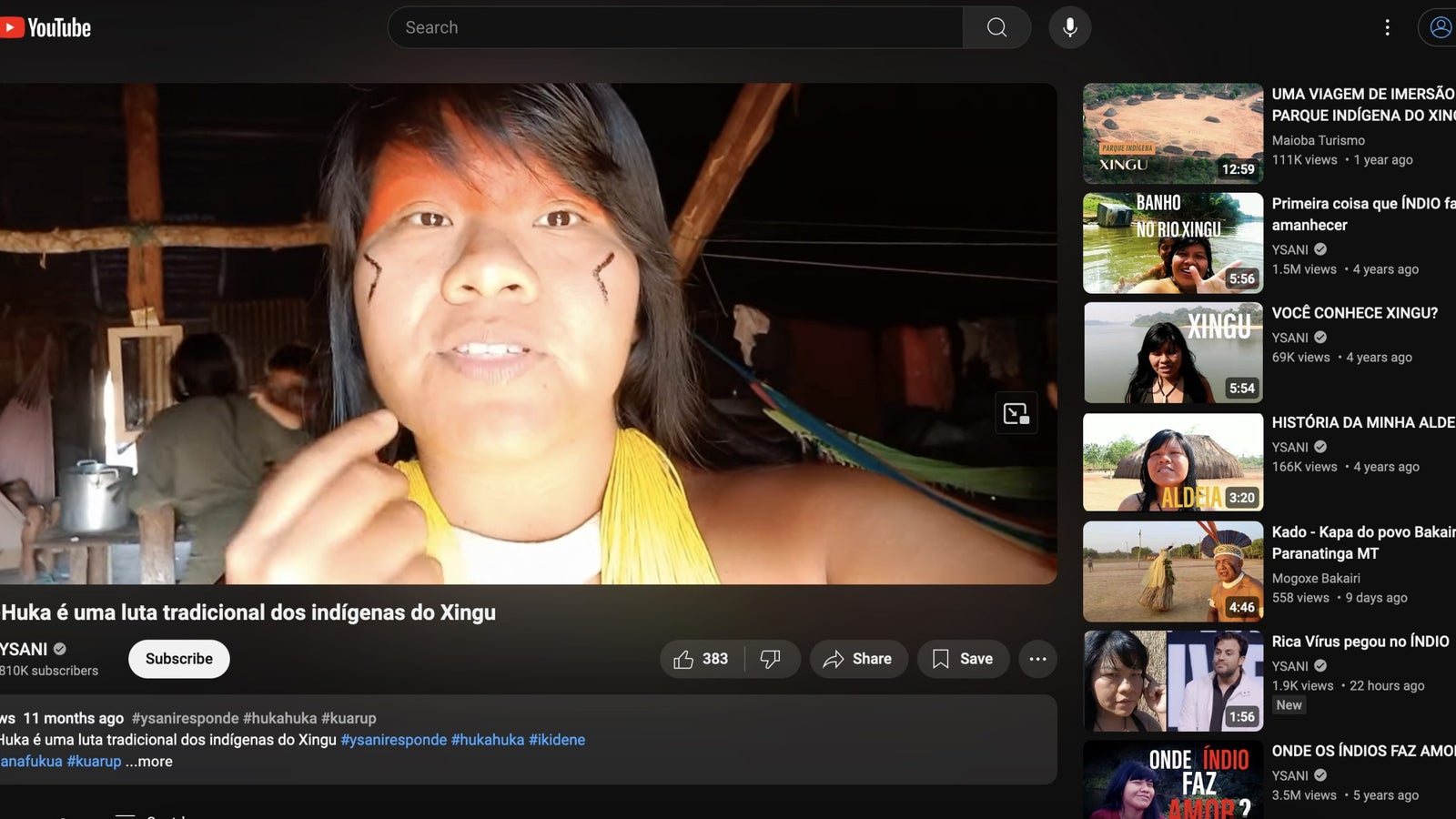 A screenshot taken from Youtube showing a Brazilian creator speaking in a selfie video on the Youtube desktop view.