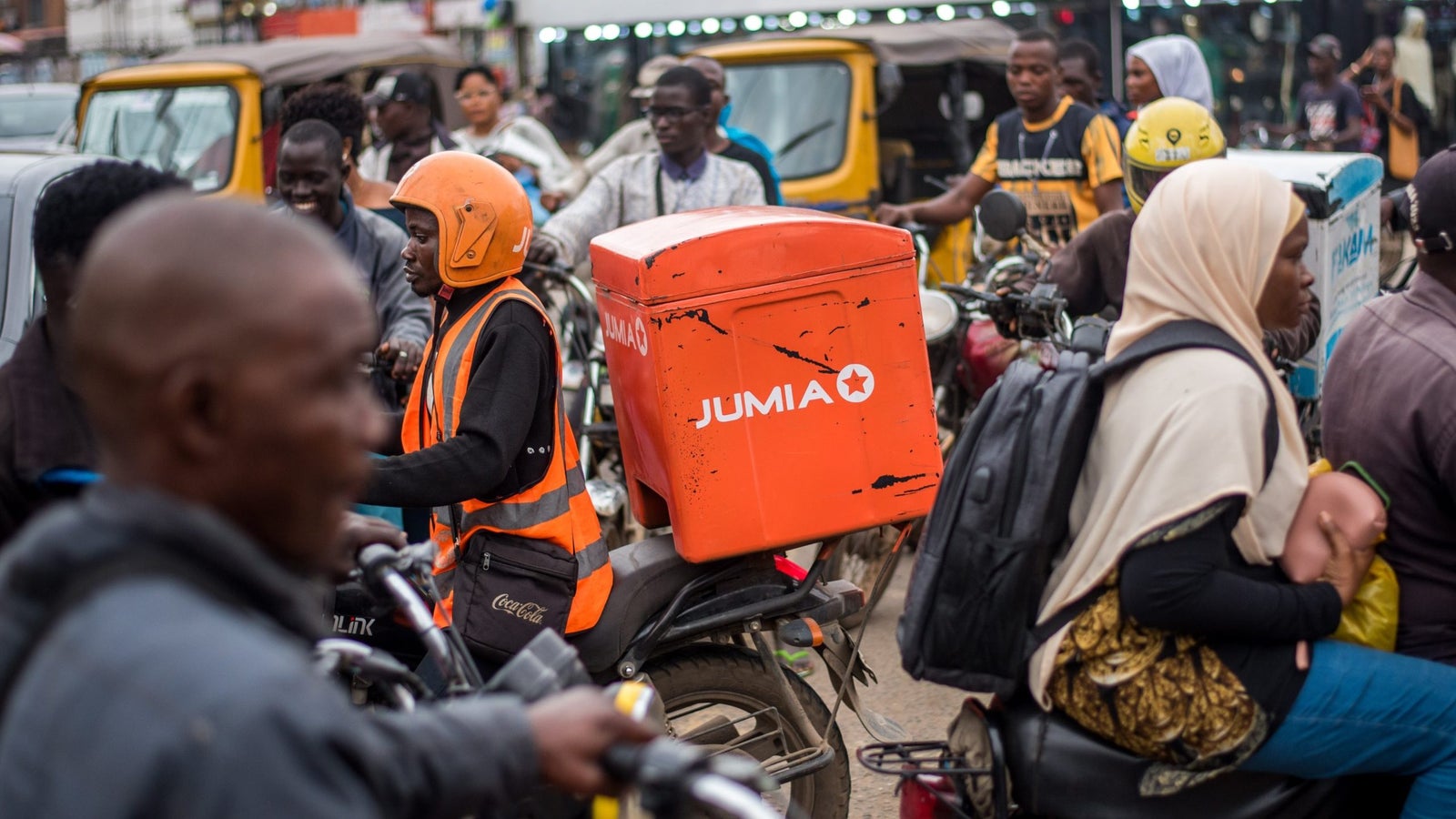 A Jumia delivery bike in the middle of street traffic in Lagos, Nigeria.